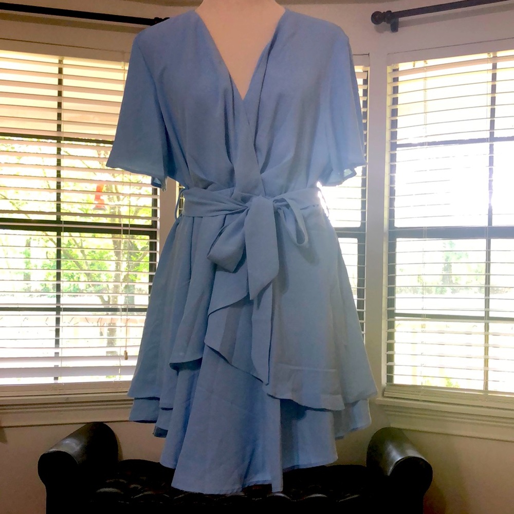 Brand new dress 2xl size it fits to xl and large as it has a belt to design.